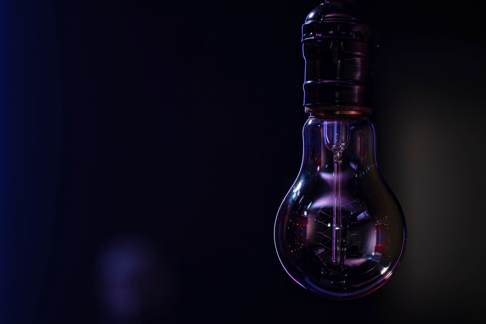 non-luminous-lamp-hangs-dark-blurred-background-copy-space-scaled.jpg