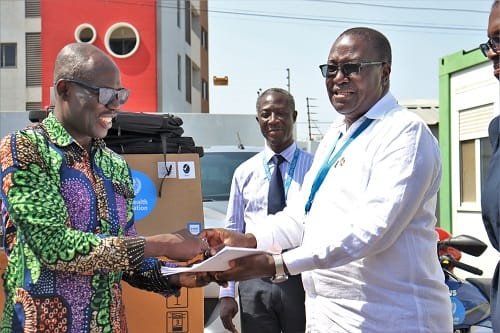 WHO-support-pix-Dr-Kasoloright-presenting-the-keys-to-DrOfosu.jpg