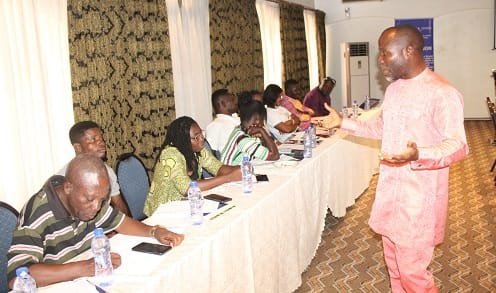 HIV-WORKSHOP-Rev.-John-K.-Azumah-standing-addressing-journalists-in-the-workshop.-Photo.-Ebo-Gorman.jpg
