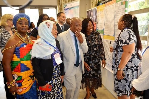 WHO-Confab......Mr-Kwaku-Agyeman-Manumiddle-with-other-participants-being-taken-round-the-poster-gallery-exhibition-after-the-opening-ceremony.-Photo.-Vincent-Dzatse..jpg