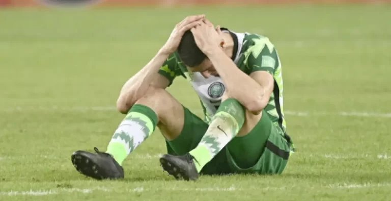 Super-Eagles-defender-Leon-Balogun-sits-dejected-on-the-pitch-after-the-2022-World-Cup-failure.jpg