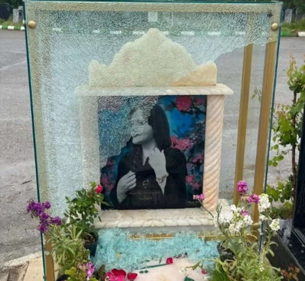 VANDALS-Glass-covering-Mahsas-tombstone-and-portrait-was-smashed.webp.webp