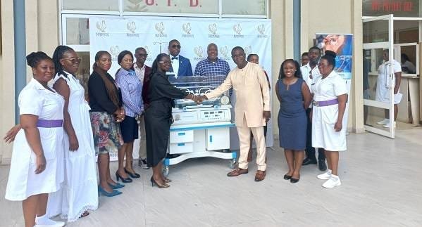 KOKROKOO-Rev.-Gabriel-Quain-handing-over-the-incubator-to-Dr-Gyimah-Asante.jpg