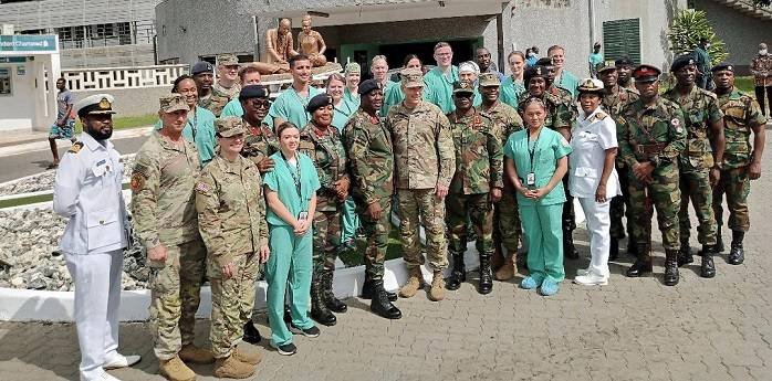 US-Military-Major-General-Wasmund-middle-with-MEDRETE-team-and-medical-doctors-at-37-military-Hospital.jpg