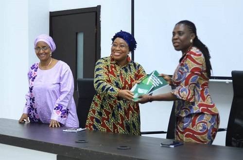 AU-COMMISSIONER-1-Ms-Cessouma-presenting-a-souvenir-to-Ms-Amma-Twum-Amoah.jpg