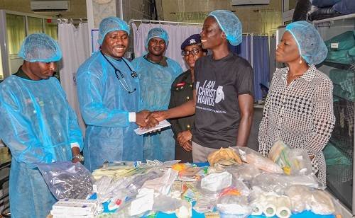 Donation-Dialysis-Ms-Akosua-Sarpong-second-from-right-presenting-the-donation-to-Lt-Cdr-Nyarko-.jpg