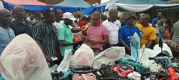NPP-COORDINATORS-1-Mr-Duker-right-presenting-the-keys-to-the-motor-cycles-to-Mr-Anthony-Donkor-Coordinator-of-Bonsa-electoral-area.jpg