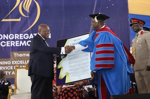 President-honoured-President-Akufo-Addo-left-receiving-a-citation-from-Prof.-William-Kofi-Koomson-.jpg