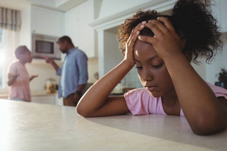 sad-girl-listening-to-her-parents-arguing-in-kitch-2021-08-28-16-44-23-utc-768x512-1.jpg