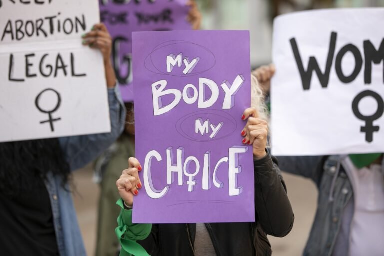 front-view-women-protesting-outdoors-scaled.jpg